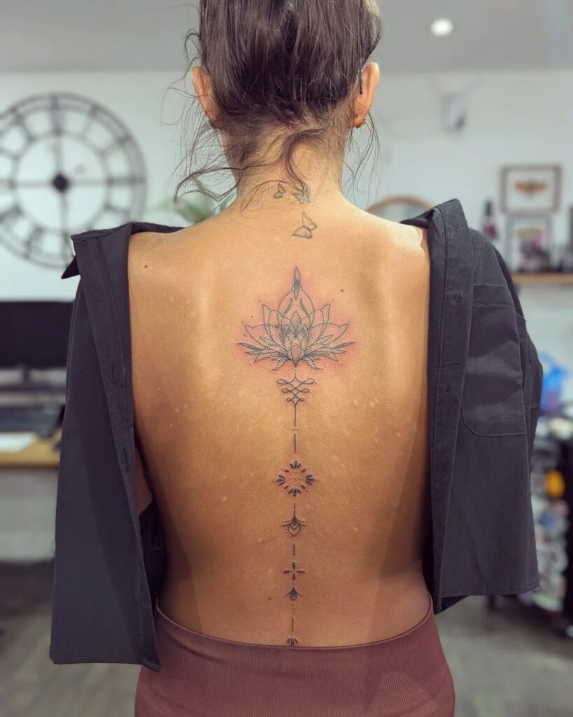 Cosmic Zodiac Spine Tattoo