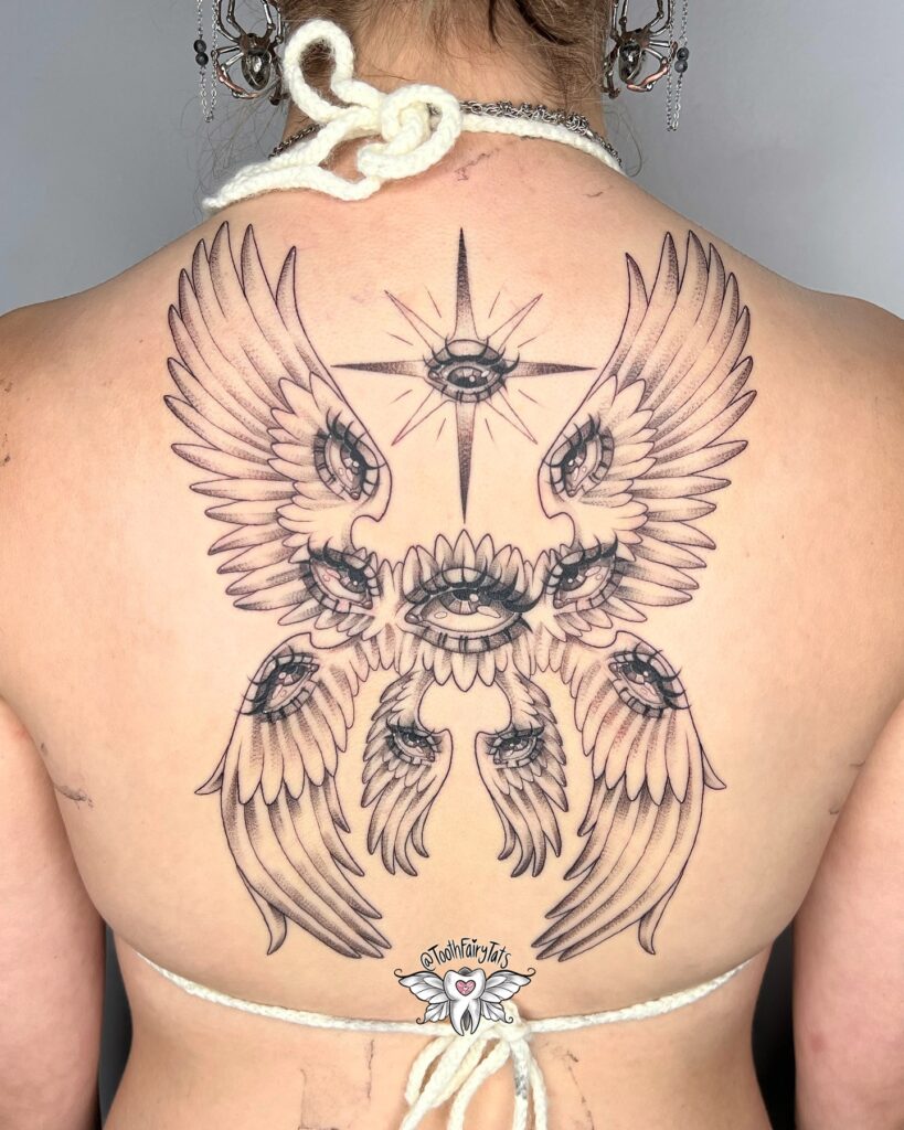 Sacred Seraphim Back Tattoo with Guiding Star seraphim angel tattoo ideas tattoo