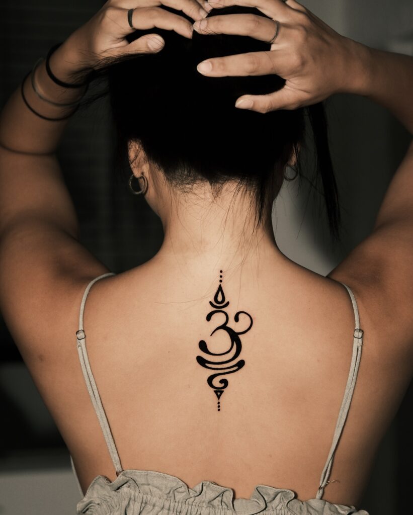 Sanskrit Om Symbol Spine Tattoo symbols tattoos tattoo