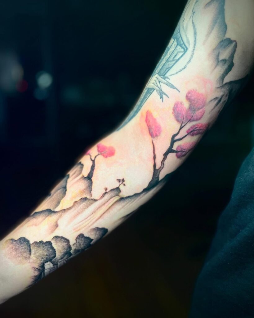 Serene Mountain Journey Tattoo cherry blossom tattoo ideas tattoo