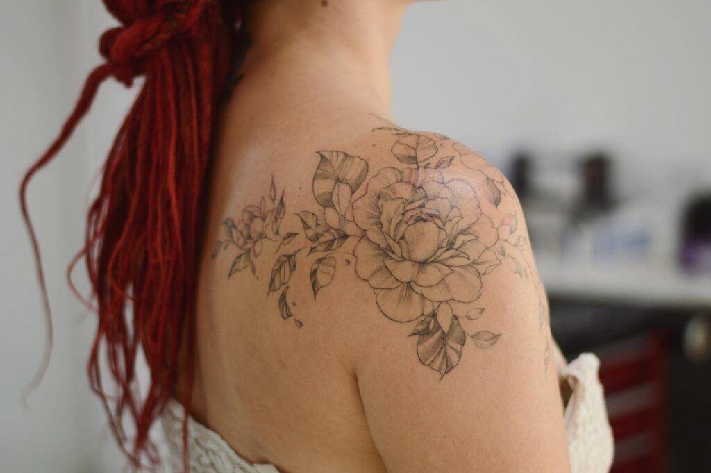 Shaded Rose and Leaves Shoulder Tattoo women shoulder flower tattoo ideas tattoo
