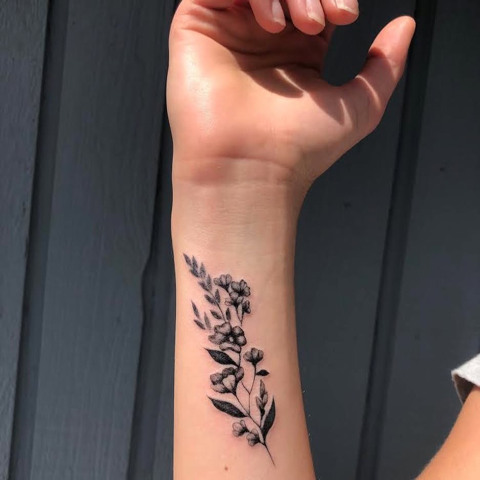 Shaded Wildflower Wrist Tattoo flower wrist tattoo ideas tattoo