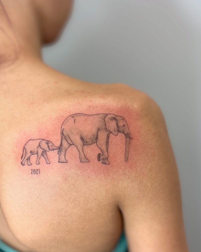 Shoulder Elephant Pair Tattoo with Date elephant family tattoo ideas tattoo
