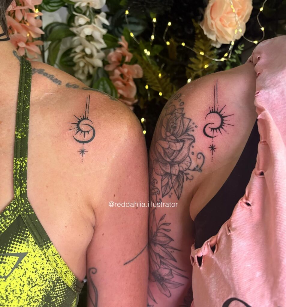 Shoulder sun and moon tattoos with starburst details