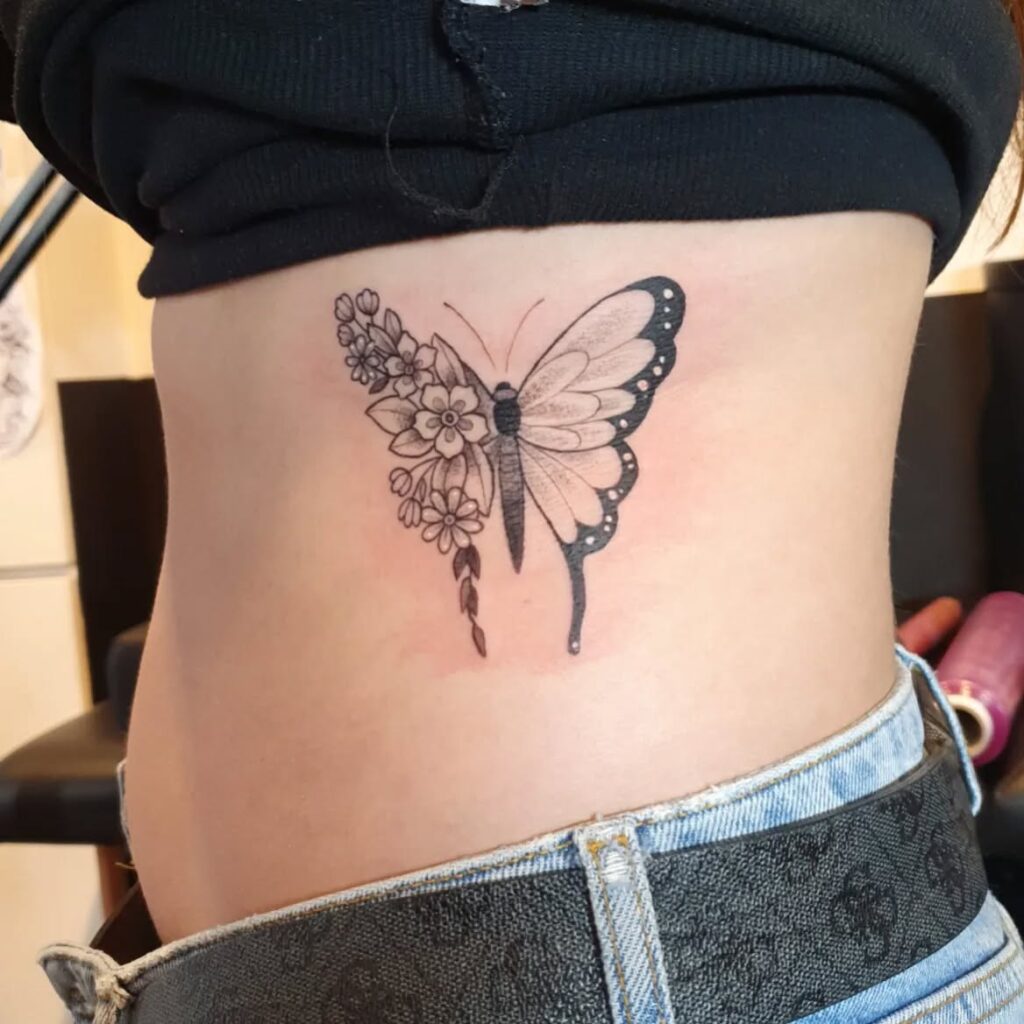 Side Butterfly and Floral Blend Tattoo half butterfly half flower tattoos tattoo