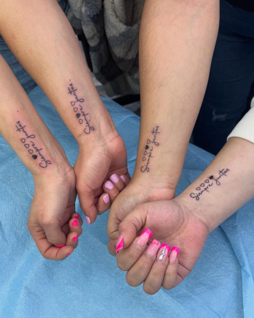 Siempre Juntas Script with Heart Accent matching family tattoo