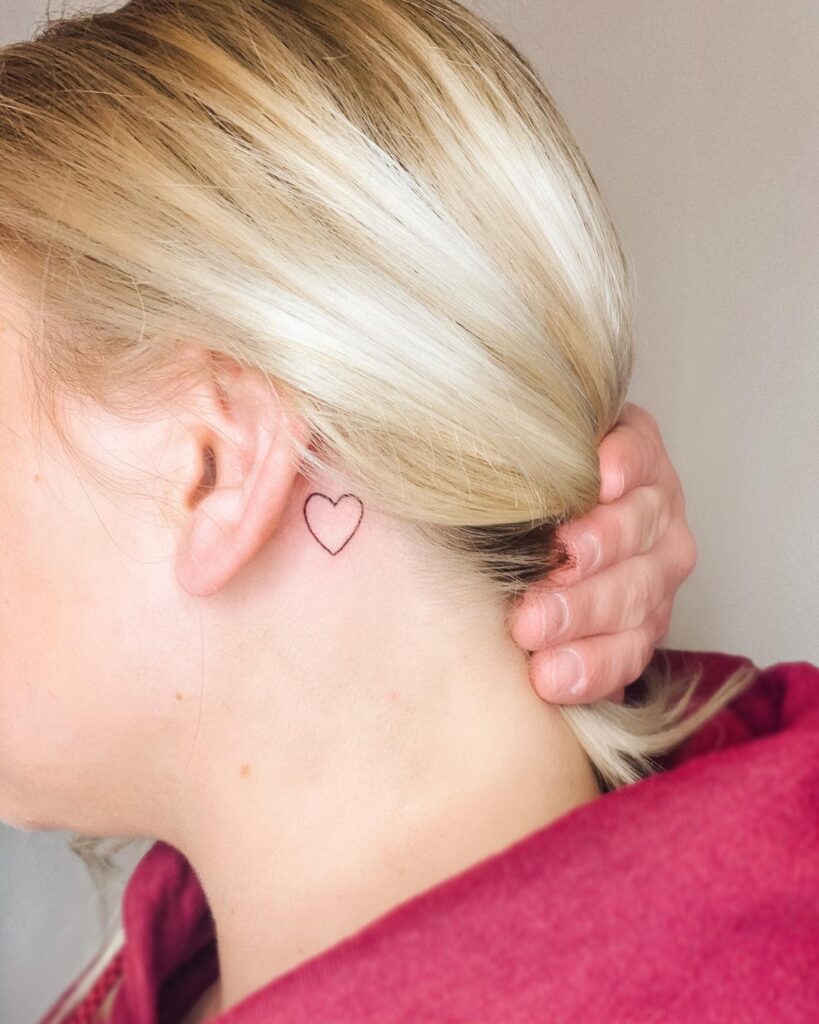 Elegant Feathered Wing Behind Ear Tattoo