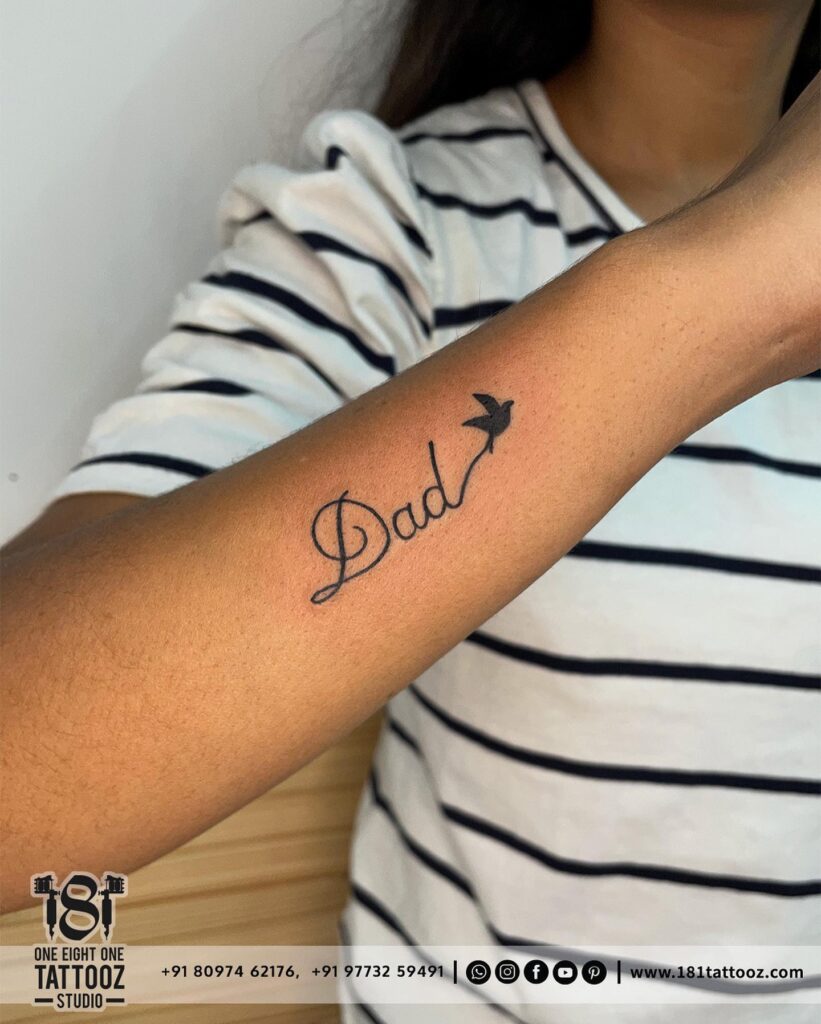 Simple “Dad” Tattoo with Bird in Flight dad tattoo ideas tattoo