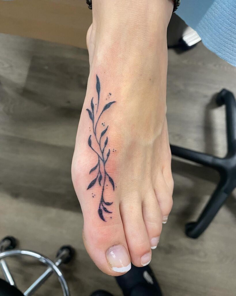 Graceful Feather Foot Tattoo