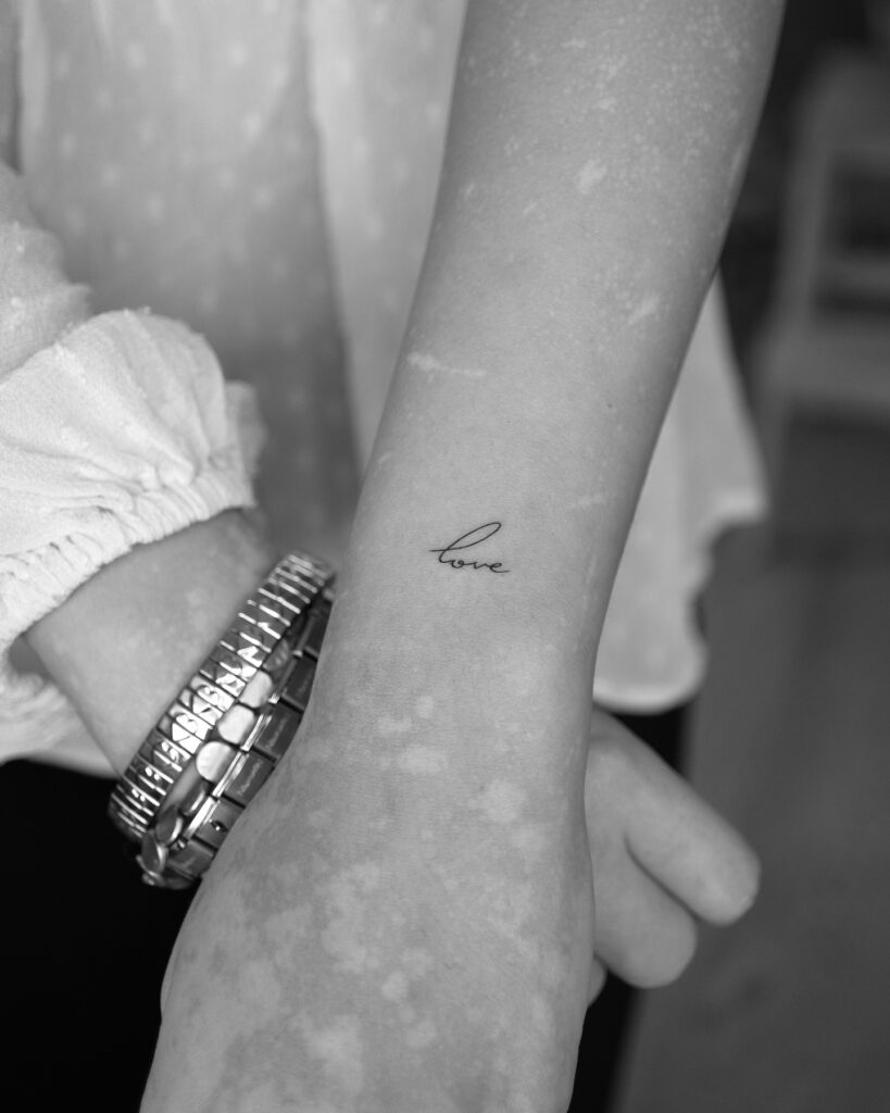 Simple Love Script Tattoo on Wrist little tattoos for women with meaning tattoo