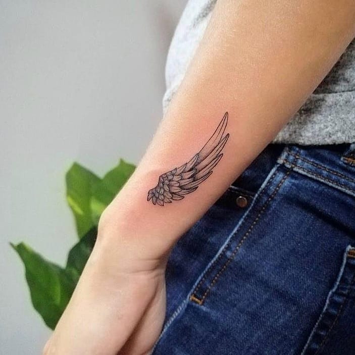 Single Elegant Angel Wing Tattoo angel wings tattoo ideas tattoo