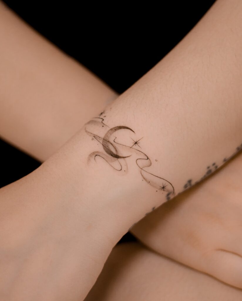 Single Needle Hummingbird in Flight fine line tattoo