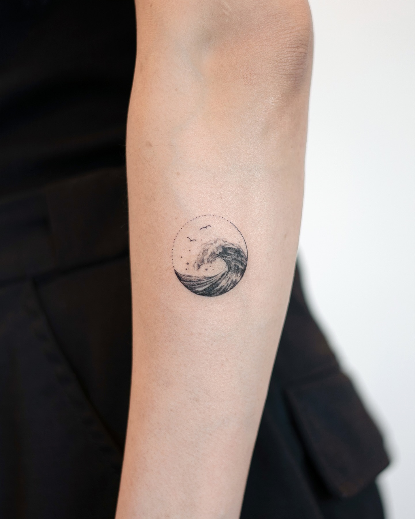 Single Needle Minimalist Barrel Wave ocean tattoo