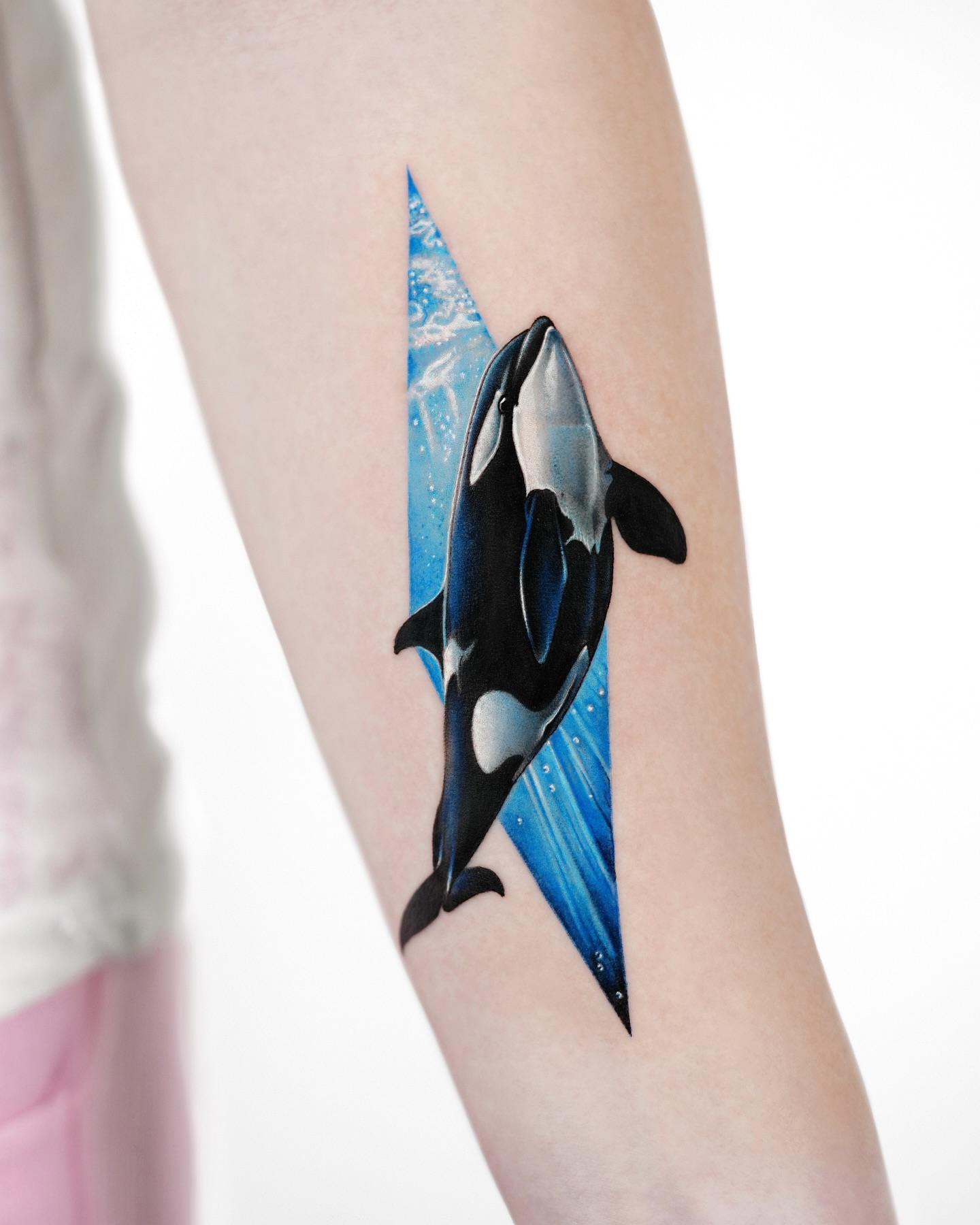 Sleek Orca Surfacing in Frigid Waters ocean tattoo