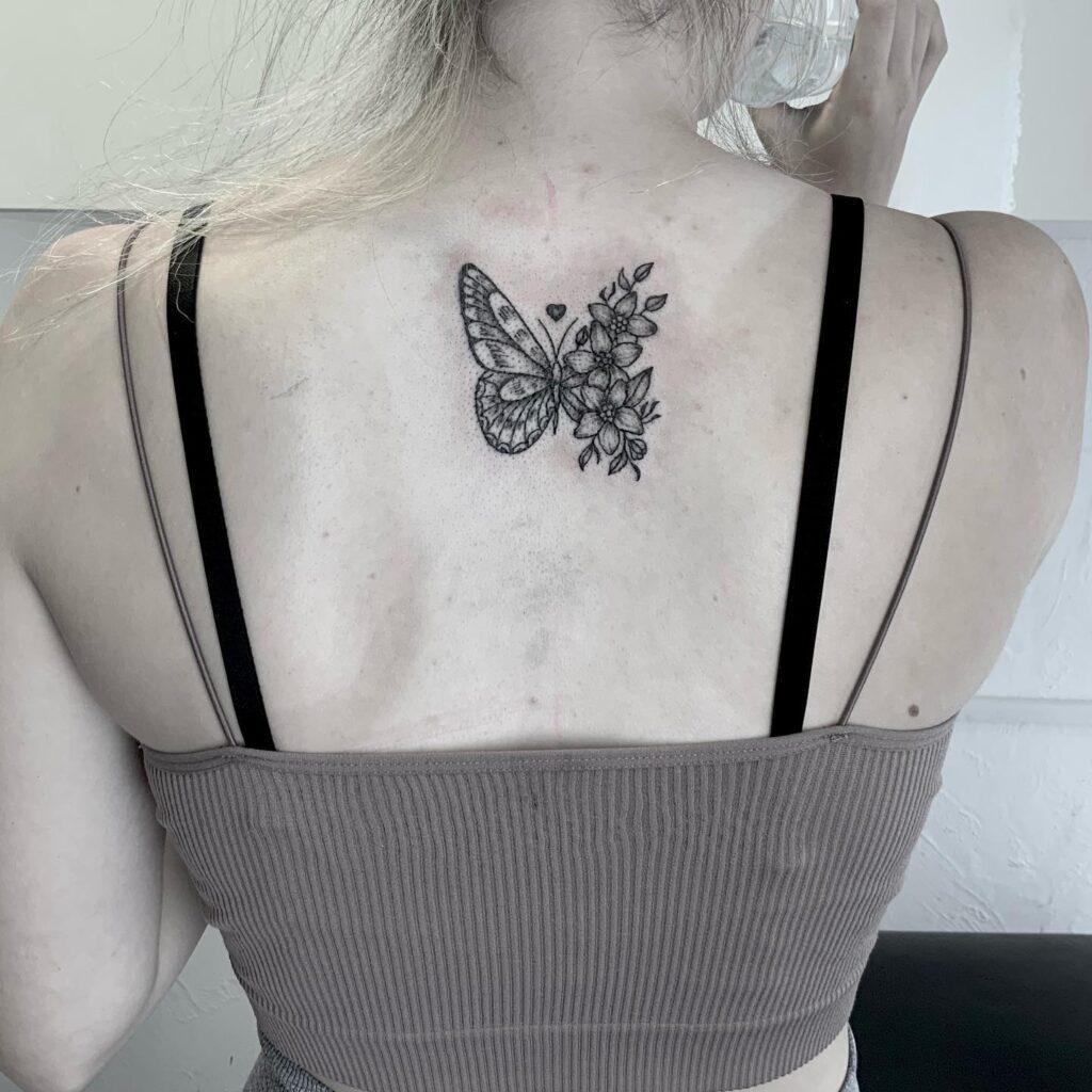 Small Back Butterfly and Floral Tattoo with Heart half butterfly half flower tattoos tattoo