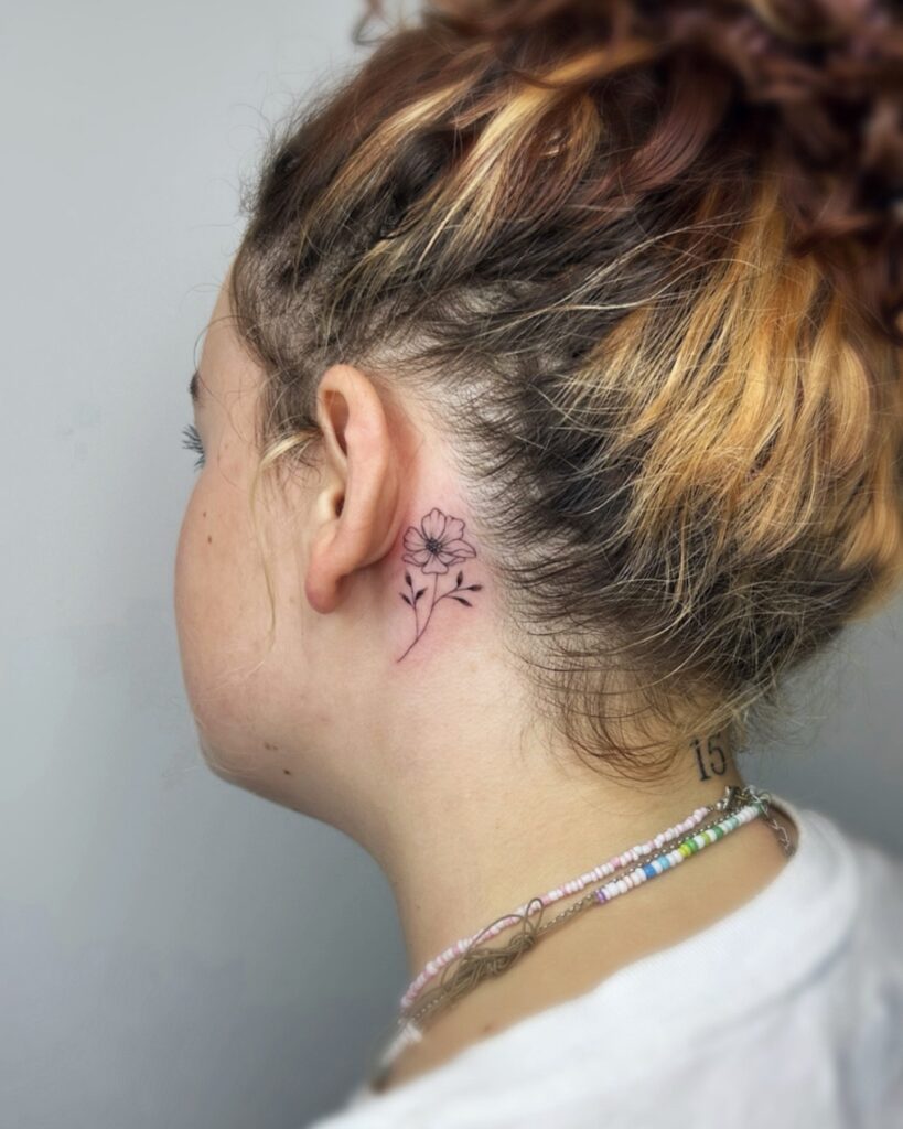 Small Behind-the-Ear Flower Tattoo minimal tiny flower tattoo ideas tattoo