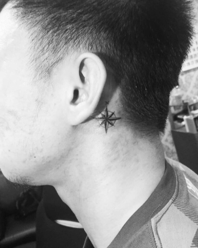 Small Compass Rose Behind the Ear behind the ear tattoo ideas for men tattoo
