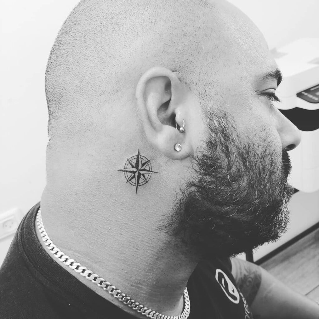 Simple Black Cross Behind Ear Tattoo behind the ear tattoo ideas for men tattoo