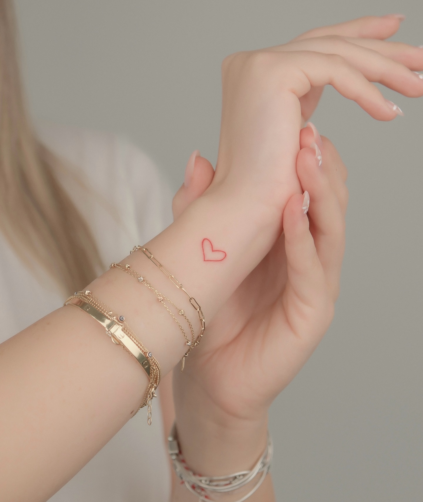 Tiny Star And Moon Phases Wrist Tattoo