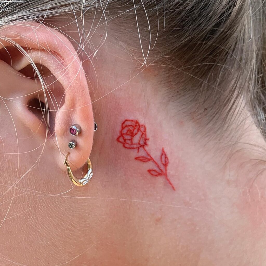 Small Red Rose Tattoo Behind the Ear rose tattoos for women tattoo