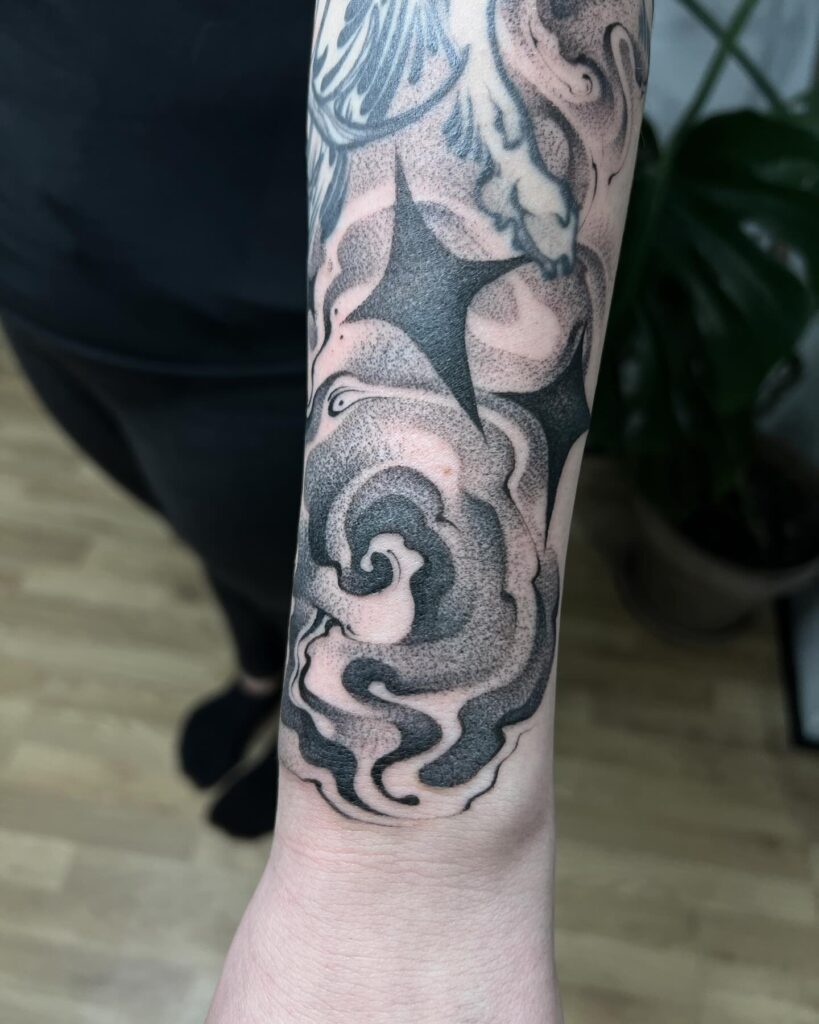 Egyptian-Inspired Sleeve Filler With Symbolic Accents Tattoo Design