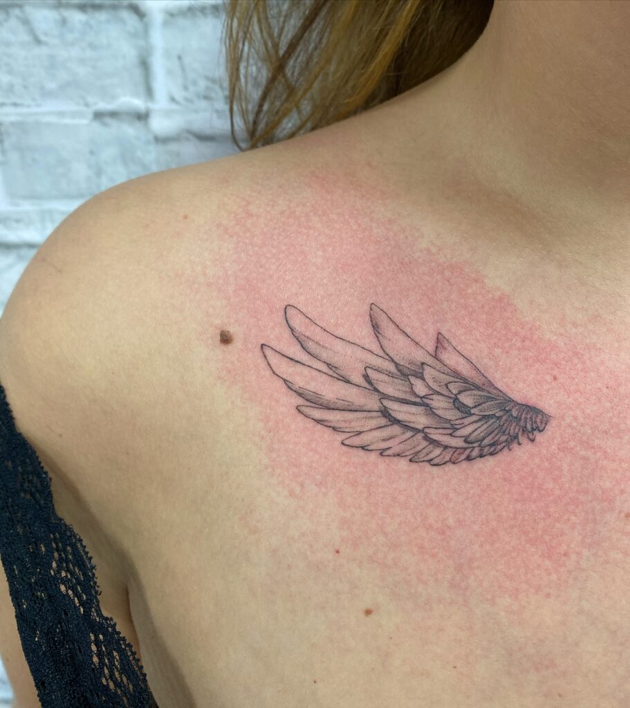 Soft Feathered Angel Wing Tattoo angel wings tattoo ideas tattoo