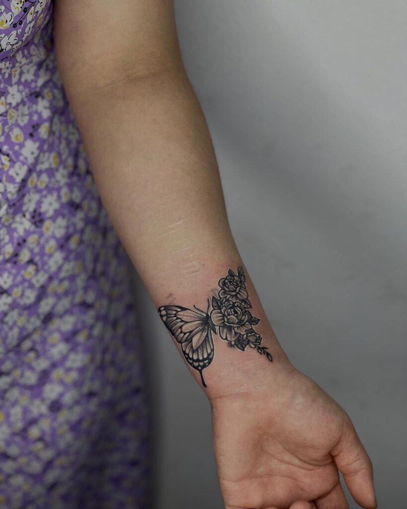 Soft Petals and Butterfly Wings Tattoo half butterfly half flower tattoos tattoo