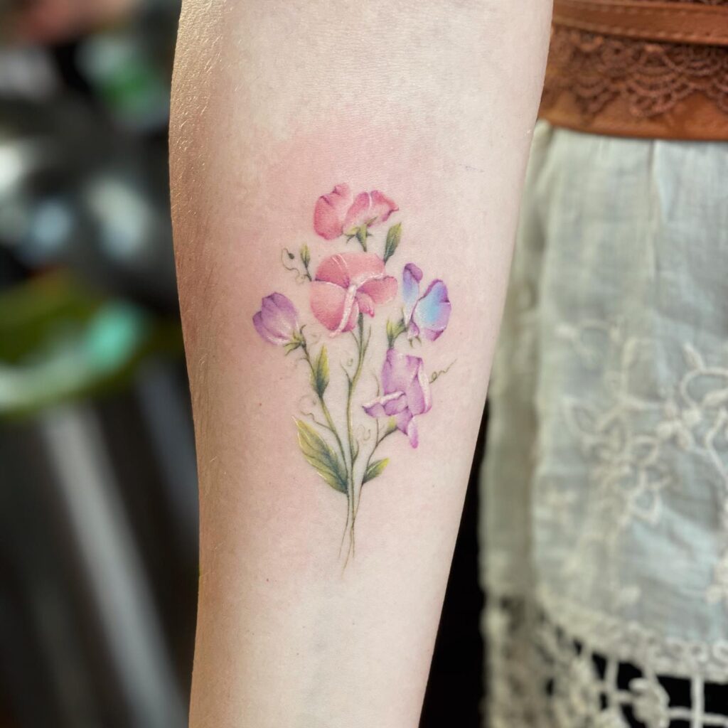 Soft Watercolor Sweet Pea Tattoo april birth flower tattoo ideas tattoo