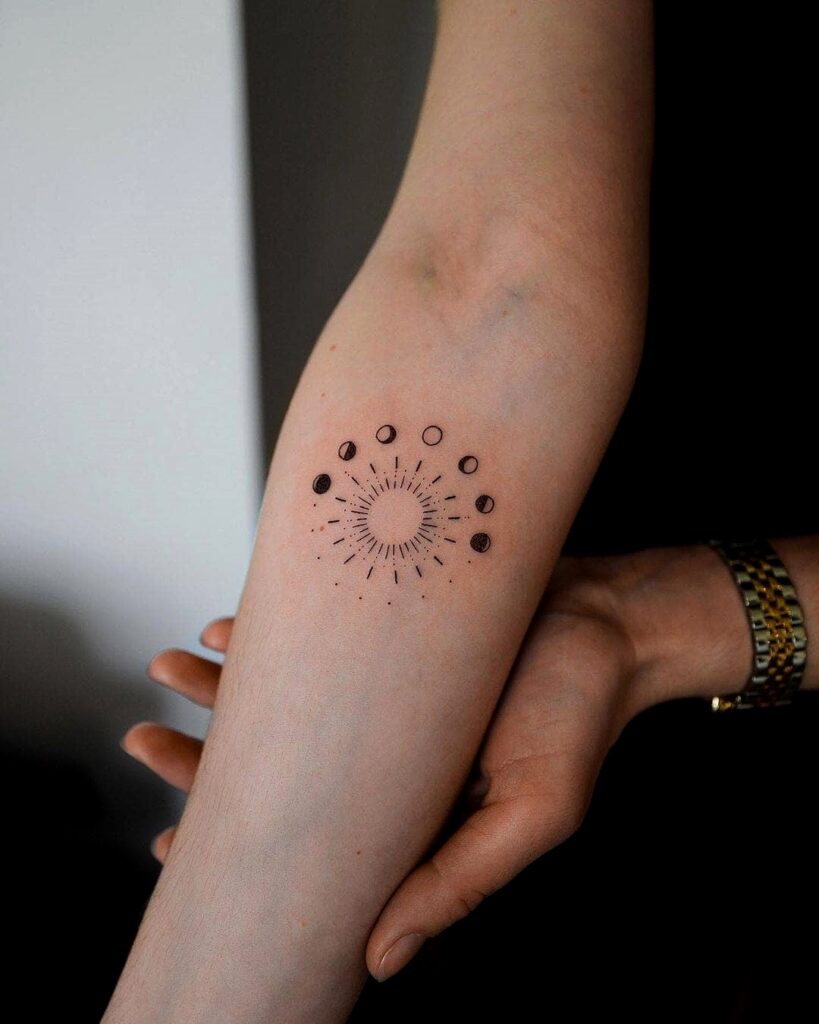 Sun and moon phases combined tattoo