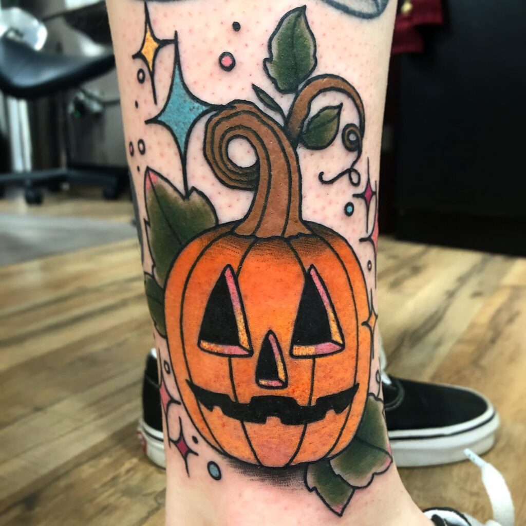 Jack O’ Lantern with Flowers and Bats Tattoo jack o lantern tattoo ideas tattoo