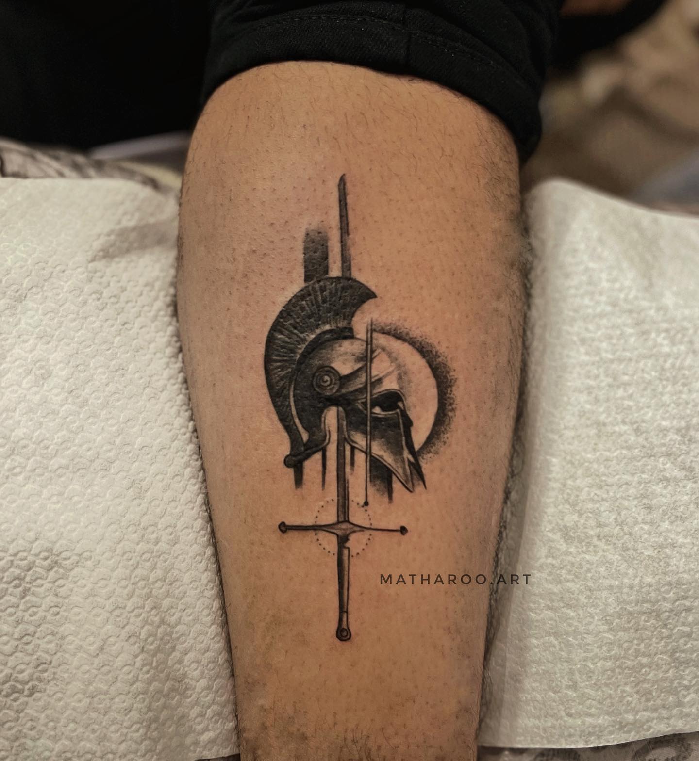 Spartan Helmet And Sword Tattoo
