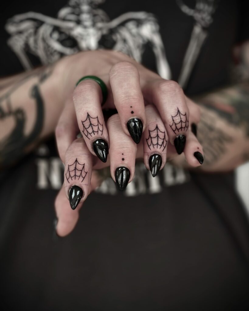 Bold Rune Finger Tattoos