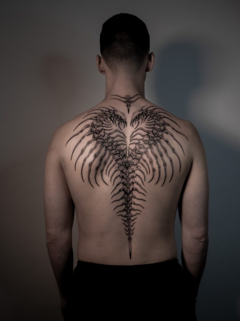 Spine-Inspired Biomechanical Back Tattoo back tattoos for guys tattoo