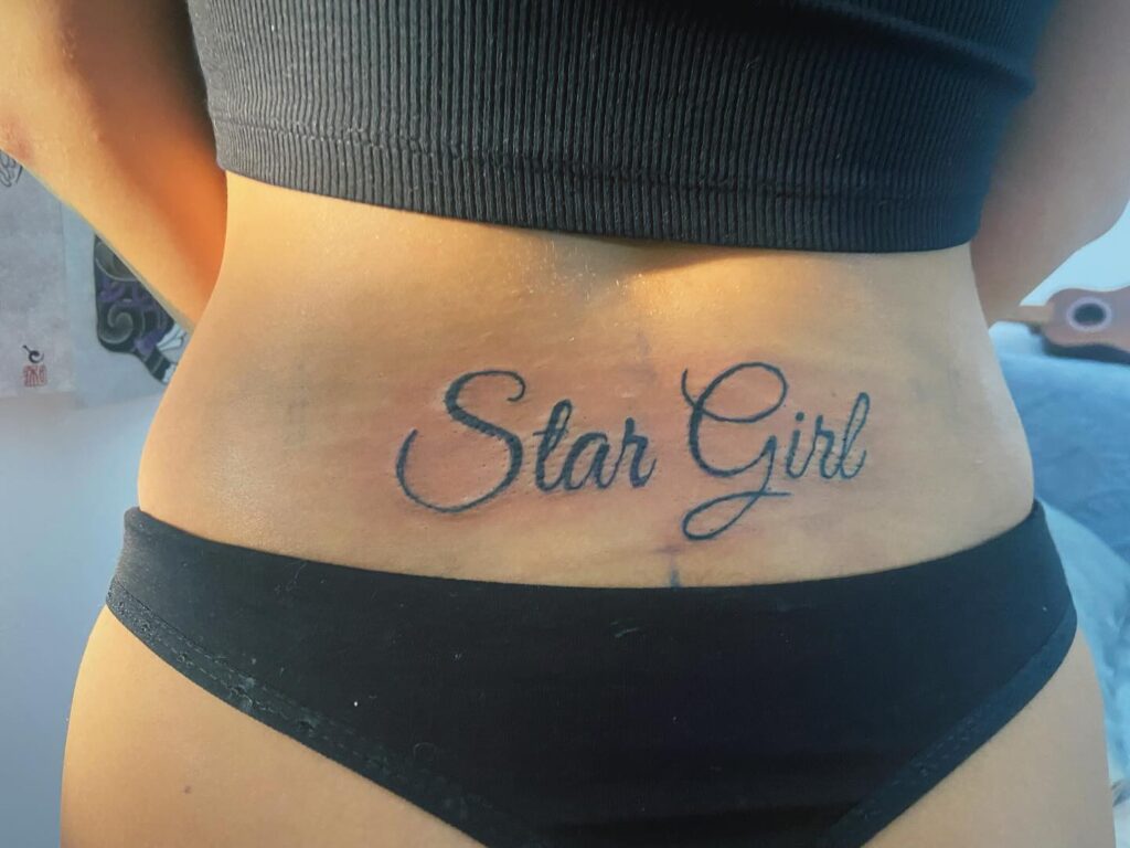 Tribal Hearts Lower Back Tattoo