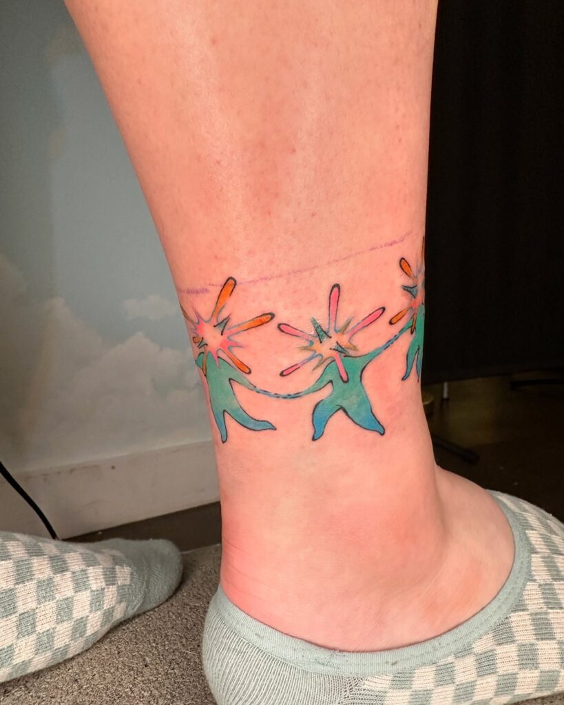 Matching Floral And Celestial Tattoos