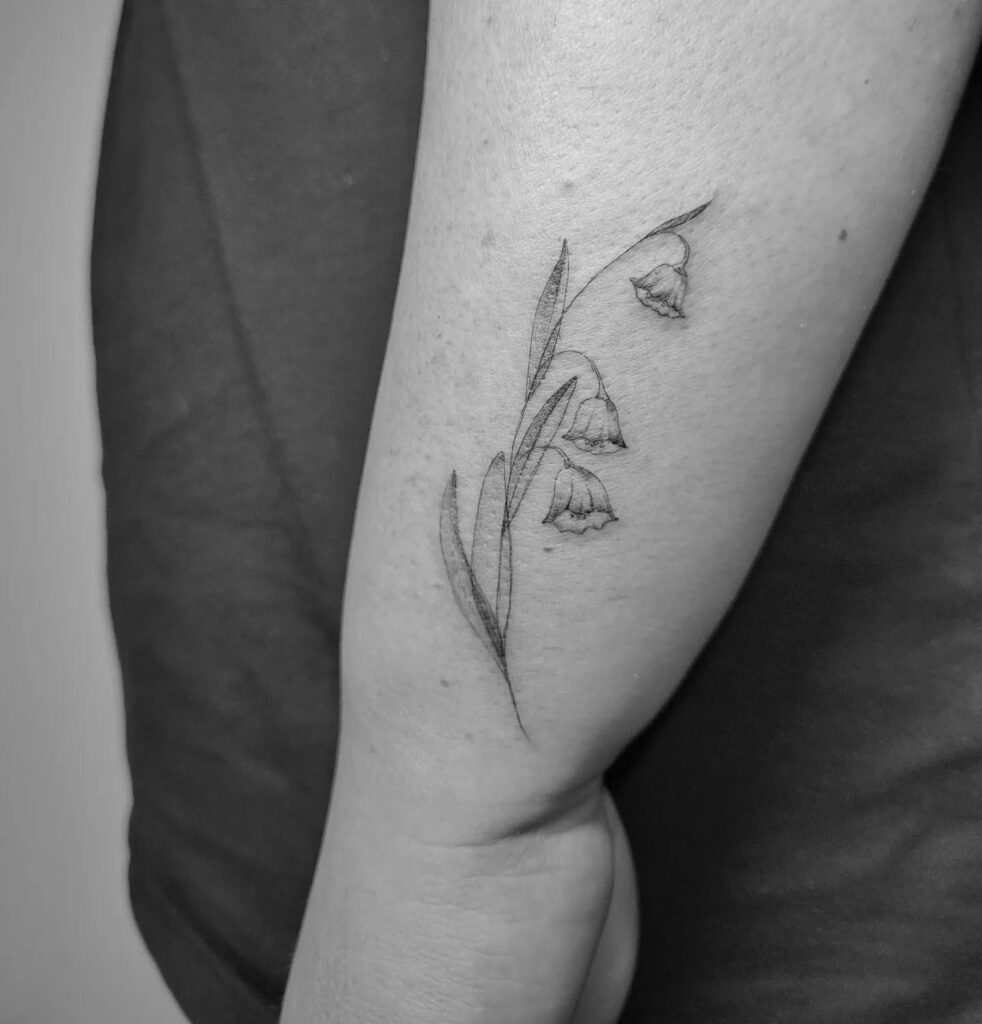 Subtle Lily of the Valley Elbow Tattoo may birth flower tattoos tattoo