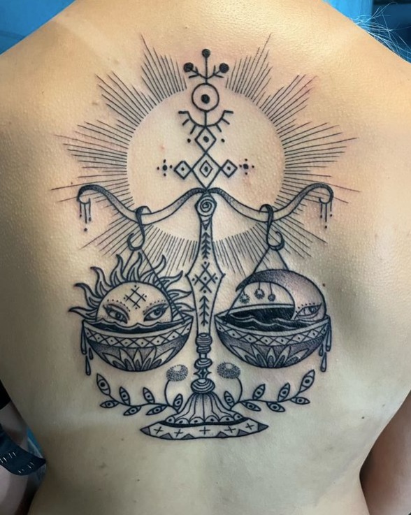 Sun and Moon Balance Tattoo symbolic sun and moon tattoo ideas tattoo
