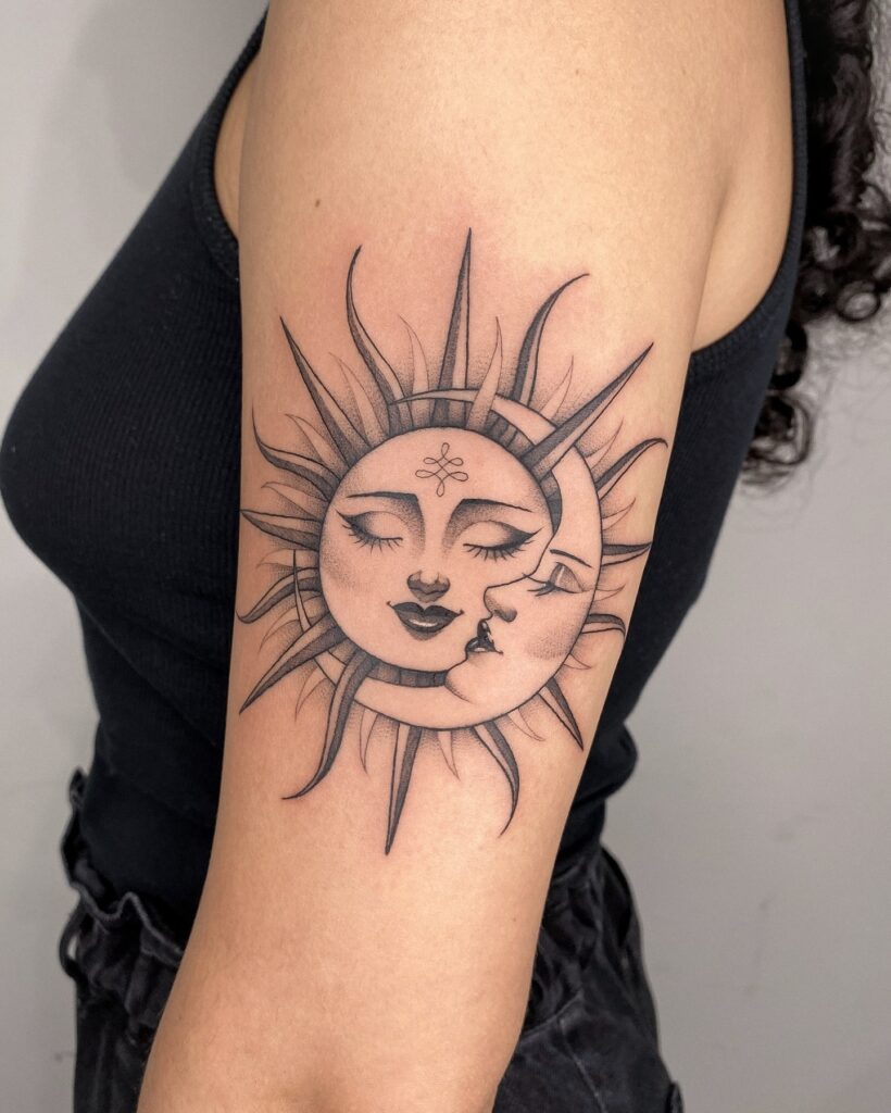 Sun and Moon Face Tattoo on Upper Arm sun tattoos tattoo
