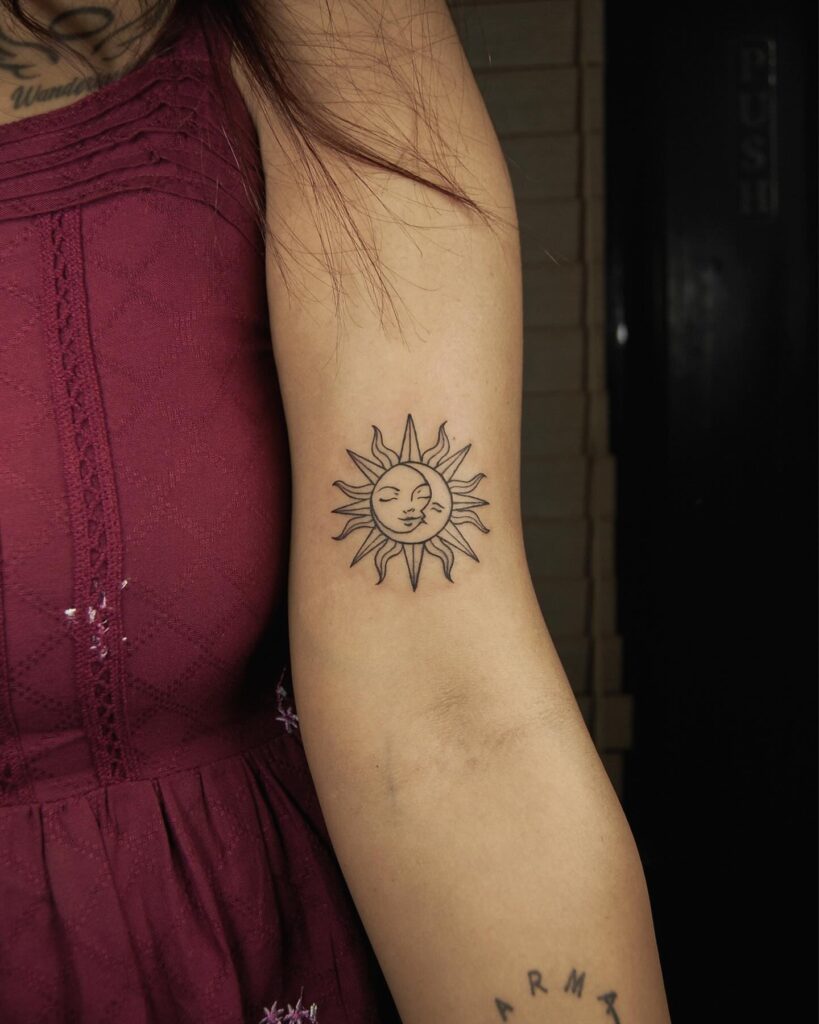 Sun and Moon Harmony Arm Tattoo symbolic sun and moon tattoo ideas tattoo