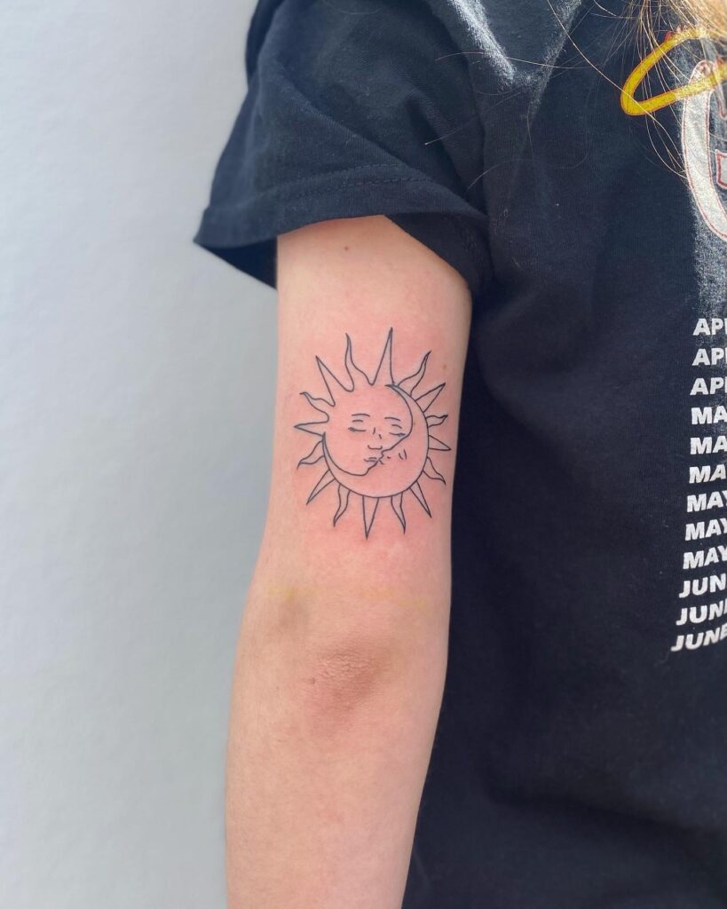 Sun and Moon Kiss Arm Tattoo symbolic sun and moon tattoo ideas tattoo