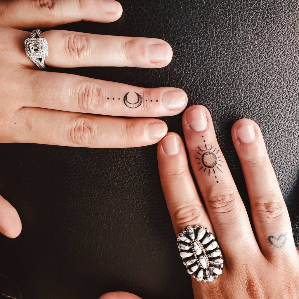 Illuminated Eye Finger Tattoo