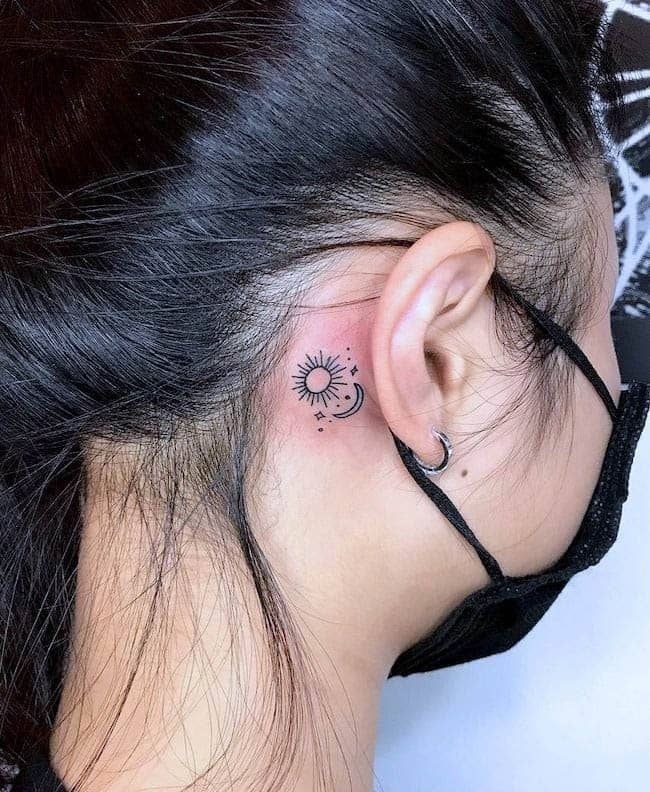 Minimal Rose Stems Behind Ear Tattoo