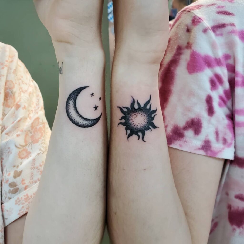Sun and Moon Wrist Pair Tattoos symbolic sun and moon tattoo ideas tattoo