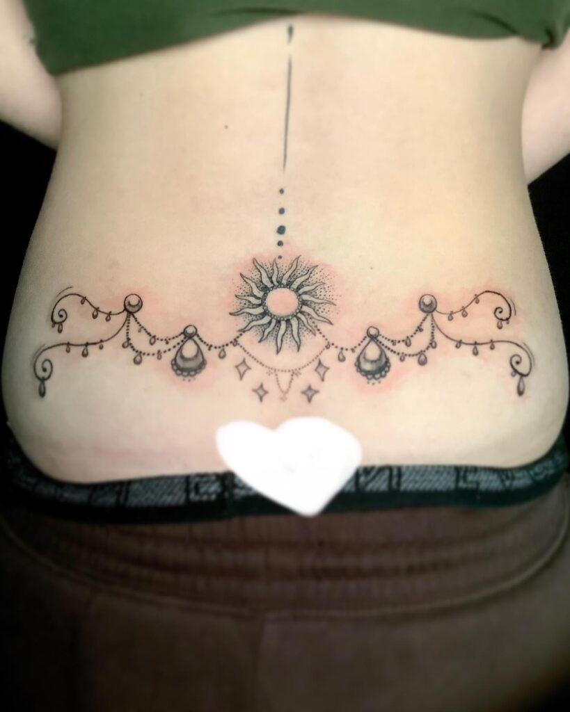 Biblical Angel Lower Back Tattoo
