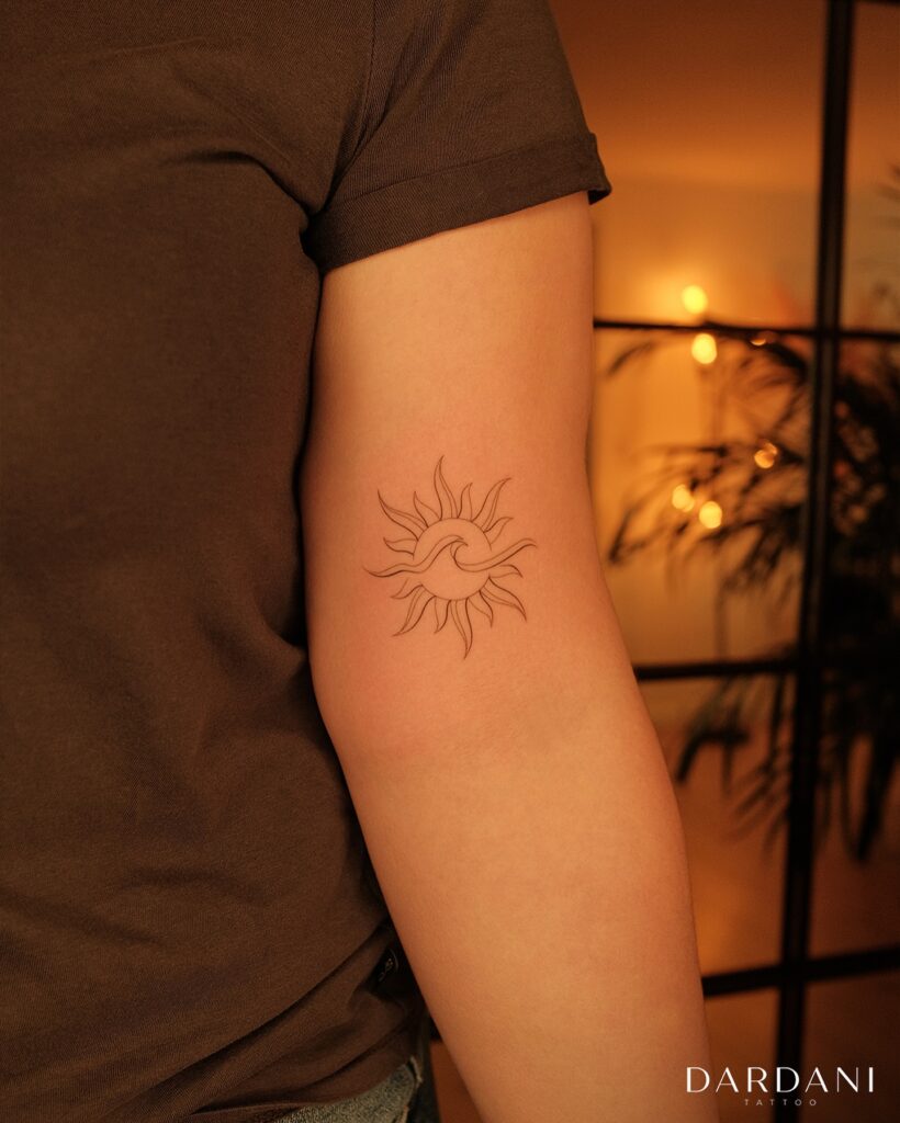 Sun and Wave Harmony Tattoo sun tattoos tattoo