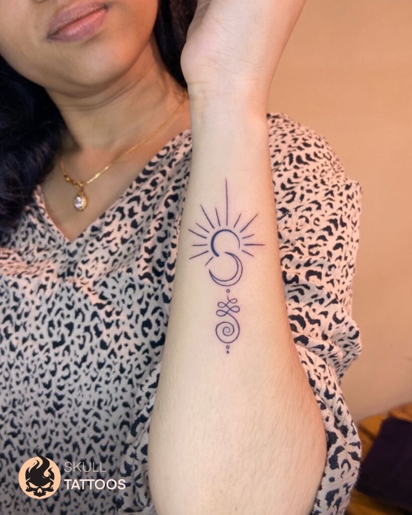 Sun, Moon, and Unalome Forearm Tattoo symbolic sun and moon tattoo ideas tattoo