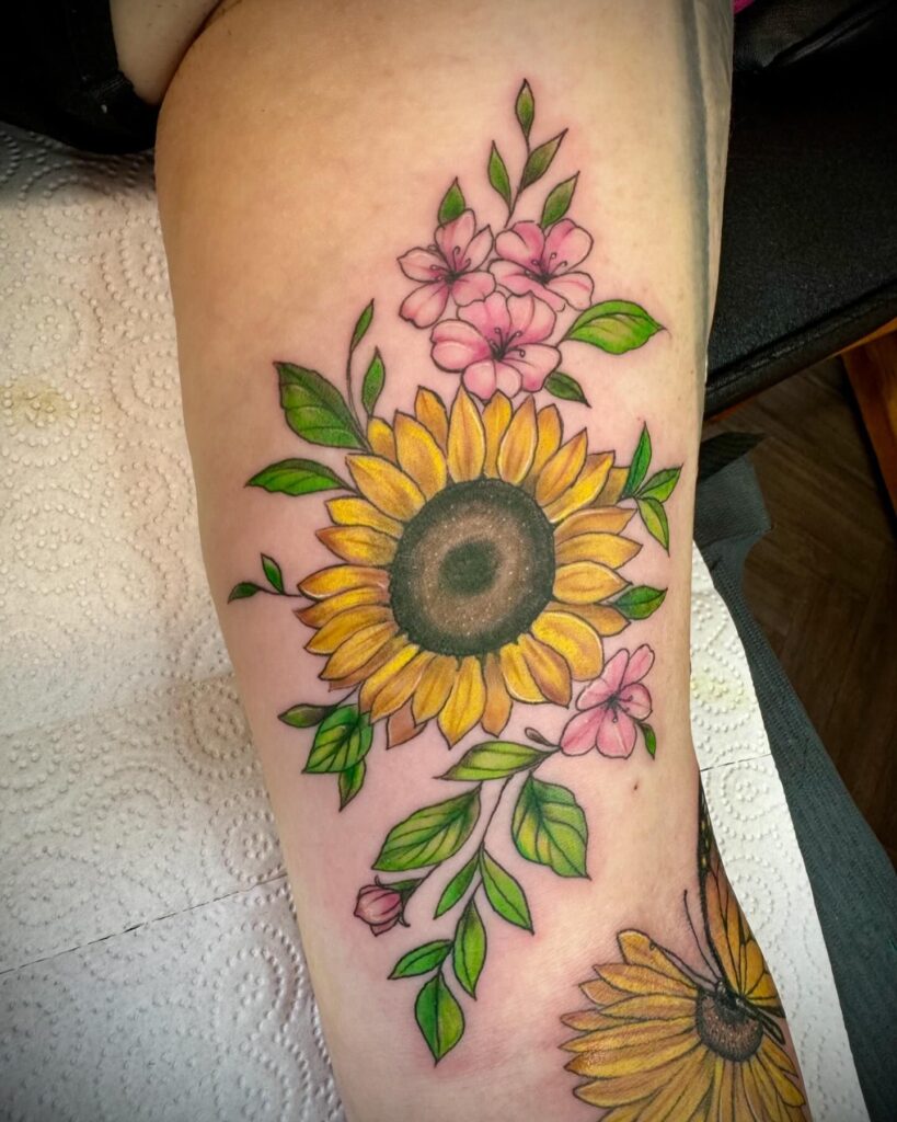 Sunflower and Pink Blossoms Arm Tattoo sunflower tattoos tattoo