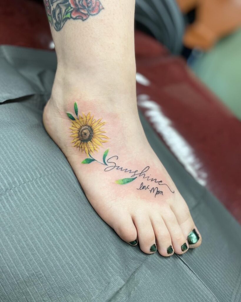 Sunflower and Script Foot Tattoo sunflower tattoos tattoo
