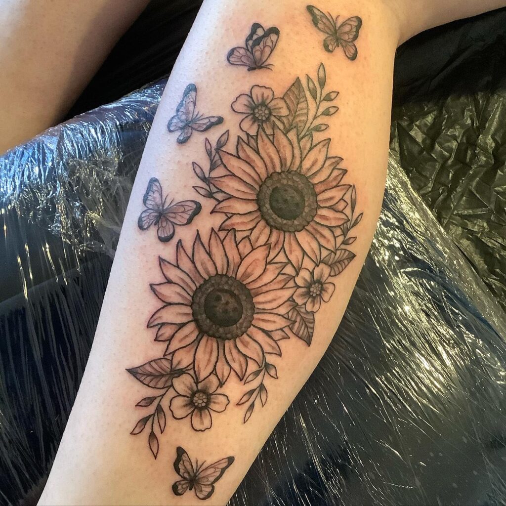 Sunflowers and Butterflies Leg Tattoo sunflower tattoos tattoo