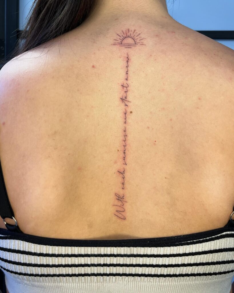 Bold Floral Spine Tattoo